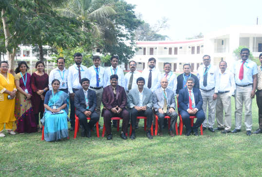 KIM harihar Campus faculties sitting together in KIM campus lawn area
